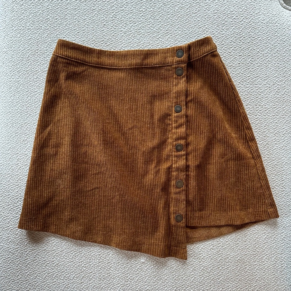 Corduroy, a-symmetric button up mini skirt. Purchased at boutique store. Size SM